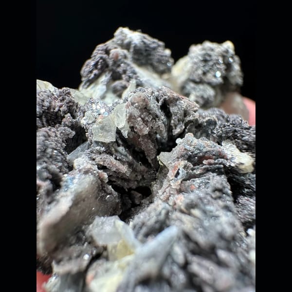 Petal calcite with specular hematite from Inner Mongolia — detail view