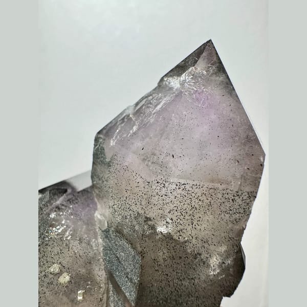 Green-skinned phantom amethyst with hematite from Inner Mongolia — alternate view