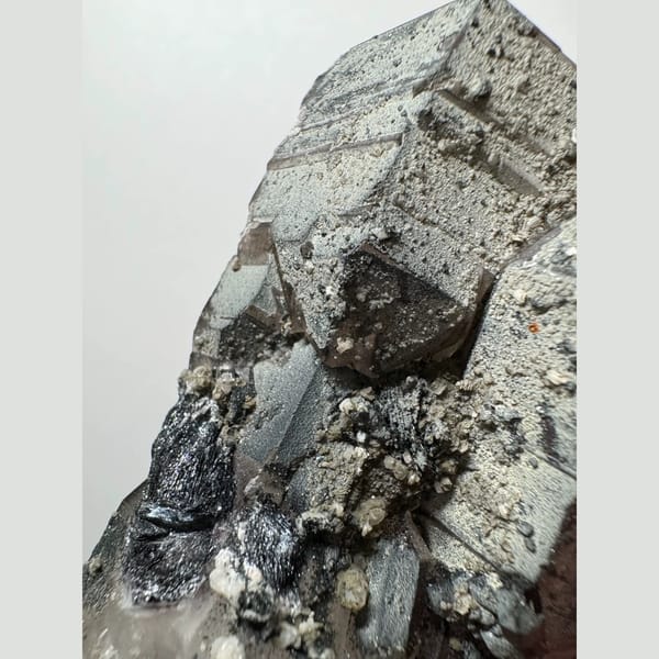 Green-skinned phantom amethyst with hematite from Inner Mongolia — detail view