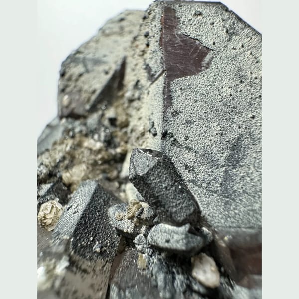 Green-skinned phantom amethyst with hematite from Inner Mongolia — detail view