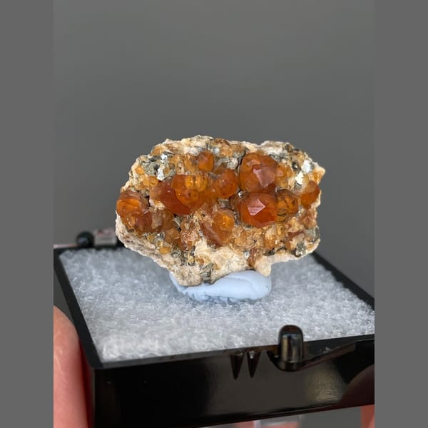 Bright orange spessartine garnet crystals from Yunxiao, Fujian — alternate view