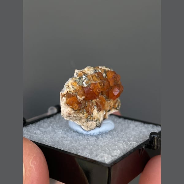 Bright orange spessartine garnet crystals from Yunxiao, Fujian — alternate view