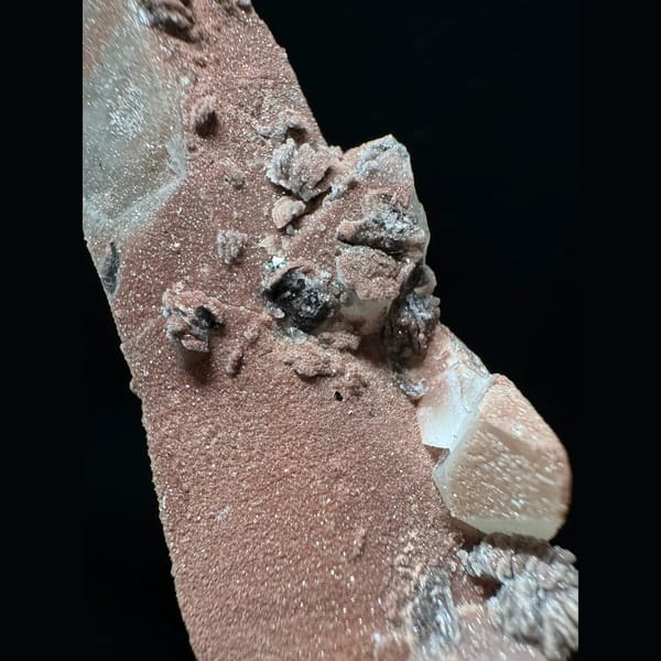Pink-skinned quartz with petal calcite and hematite from Inner Mongolia — detail view