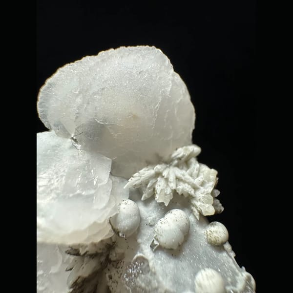Quartz with dogtooth, petal and ball calcite from Inner Mongolia — detail view