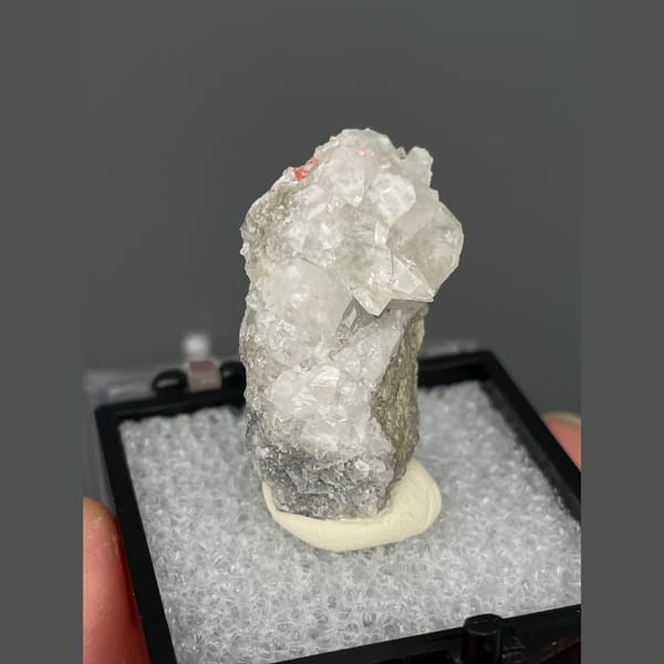 Small frosted white calcite crystal from Shimen, Hunan — complete view