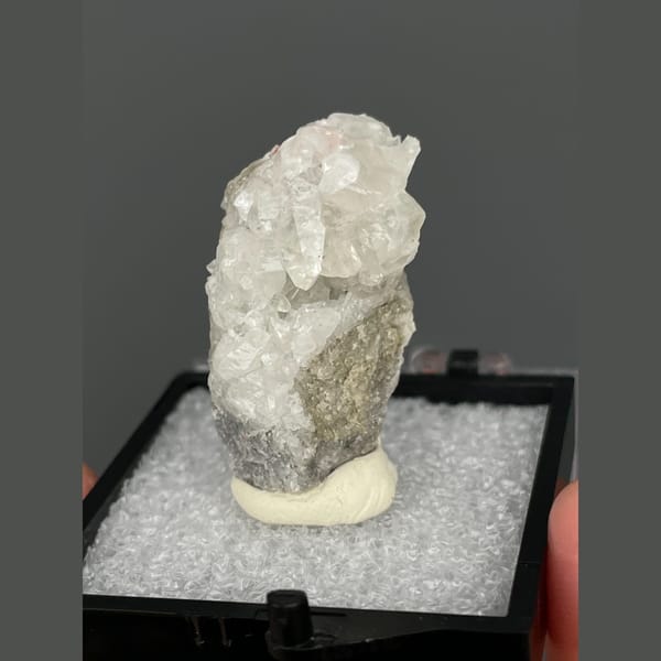 Small frosted white calcite crystal from Shimen, Hunan — alternate view