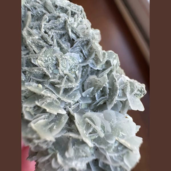 Quartz floater with blue-green petal calcite from Inner Mongolia — alternate view