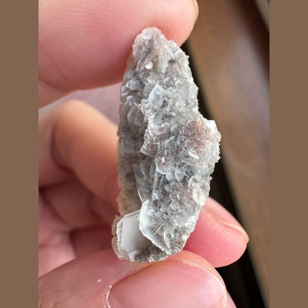 Small quartz with pale pink petal calcite and hematite from Inner Mongolia — alternate view