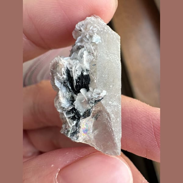 Small quartz with pale pink petal calcite and hematite from Inner Mongolia — alternate view