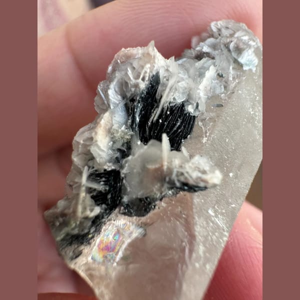 Small quartz with pale pink petal calcite and hematite from Inner Mongolia — detail view