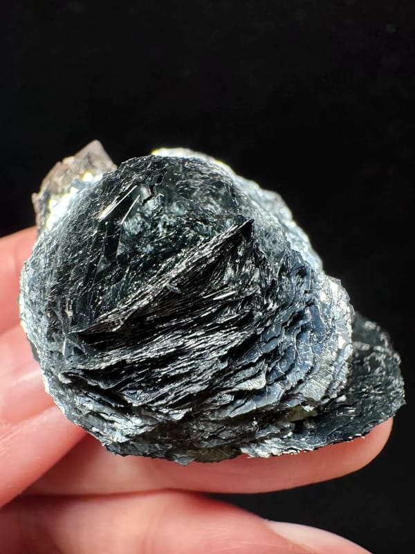 Hematite rosette from Inner Mongolia — complete tilted face with silvery highlights