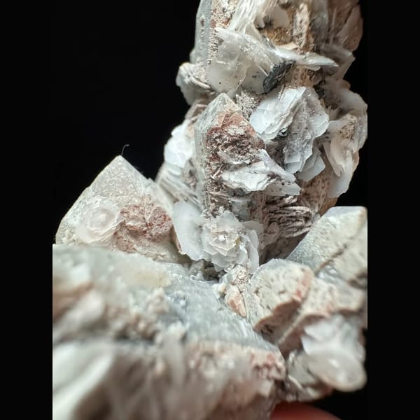 Velvety quartz with calcite and hematite from Inner Mongolia — detail view