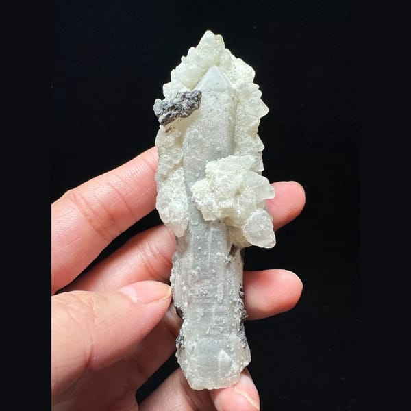 Quartz floater with white calcite and hematite from Inner Mongolia — complete view