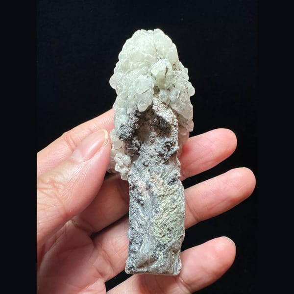 Quartz floater with white calcite and hematite from Inner Mongolia — alternate view