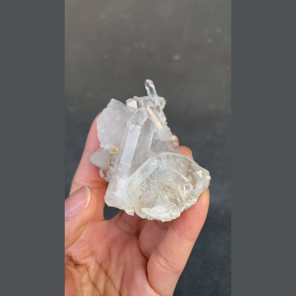 Clear quartz cluster with pale blue aquamarine from Xuebaoding, Sichuan — alternate view
