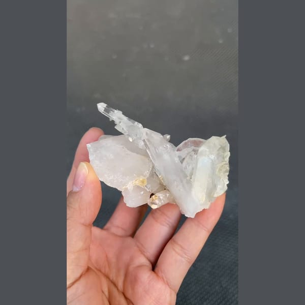 Clear quartz cluster with pale blue aquamarine from Xuebaoding, Sichuan — detail view