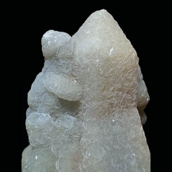 Quartz with lacy calcite crust from Inner Mongolia — detail view
