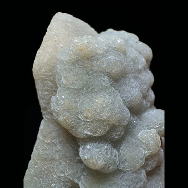 Quartz with lacy calcite crust from Inner Mongolia — detail view