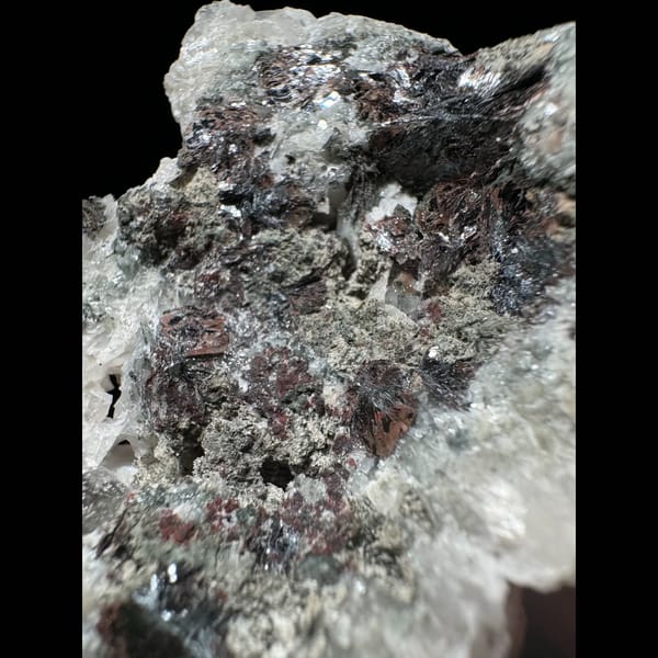 Coin petal calcite with hematite from Inner Mongolia — detail view