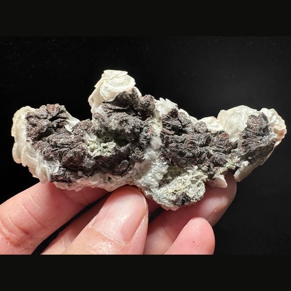 Coin calcite string with red petal calcite and hematite from Inner Mongolia — alternate view