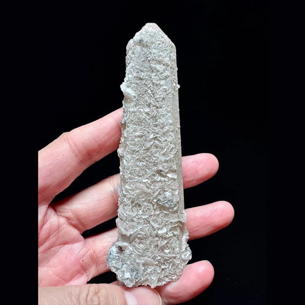 Quartz floater with pale pink petal calcite from Inner Mongolia — complete view