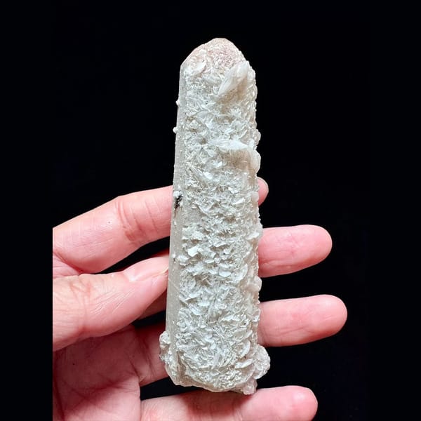 Quartz floater with pale pink petal calcite from Inner Mongolia — alternate view