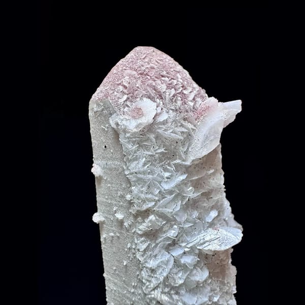 Quartz floater with pale pink petal calcite from Inner Mongolia — detail view