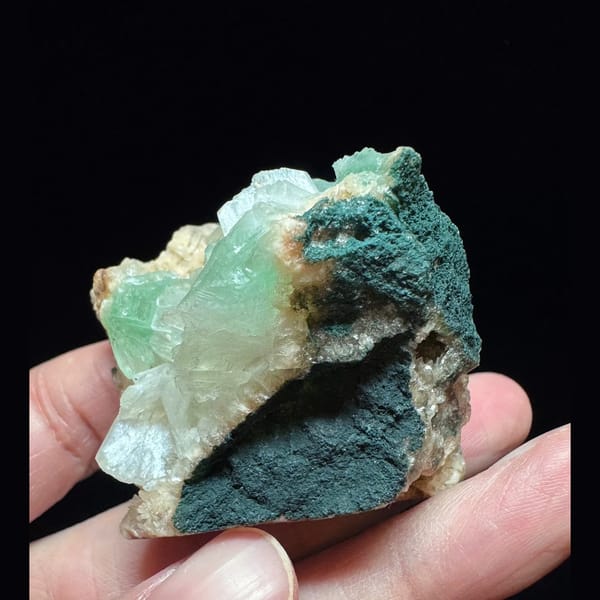 Green apophyllite with pink zeolite from India — detail view