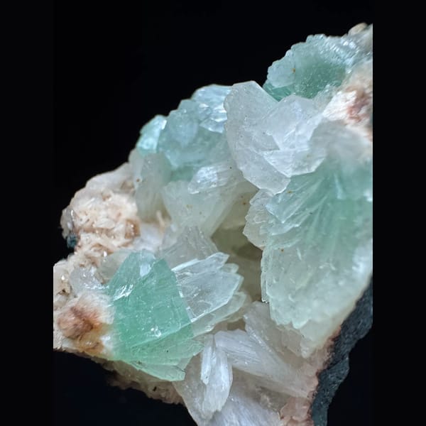 Green apophyllite with pink zeolite from India — detail view