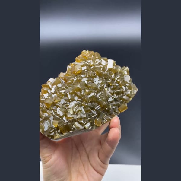 Golden-brown bladed barite crystals over fluorite from Jiangxi — alternate view