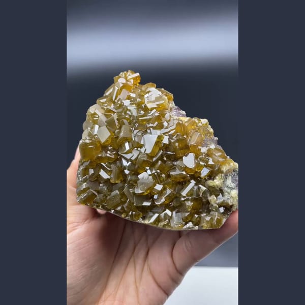 Golden-brown bladed barite crystals over fluorite from Jiangxi — alternate view