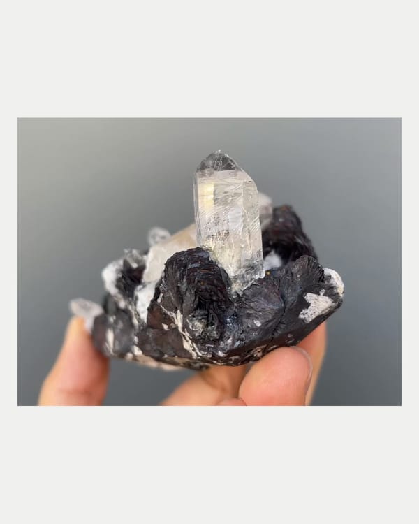 Complete left oblique view of specular hematite with quartz