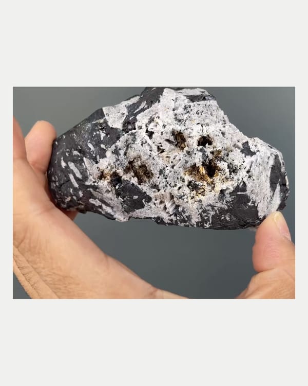Complete right oblique view of specular hematite with quartz