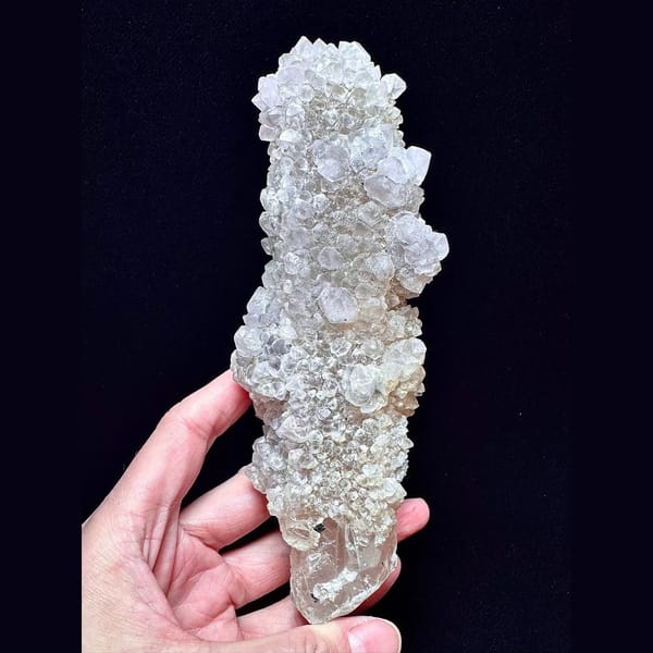Large quartz with secondary amethyst and hematite from Inner Mongolia — alternate view