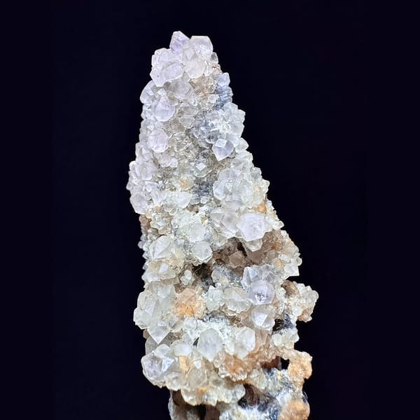 Tall quartz with secondary amethyst and hematite from Inner Mongolia — alternate view