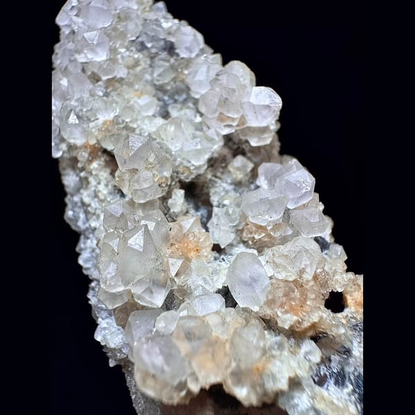 Tall quartz with secondary amethyst and hematite from Inner Mongolia — detail view