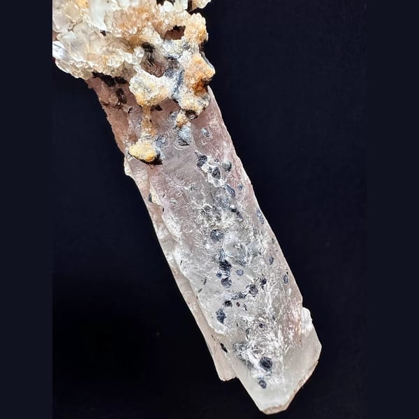 Tall quartz with secondary amethyst and hematite from Inner Mongolia — detail view