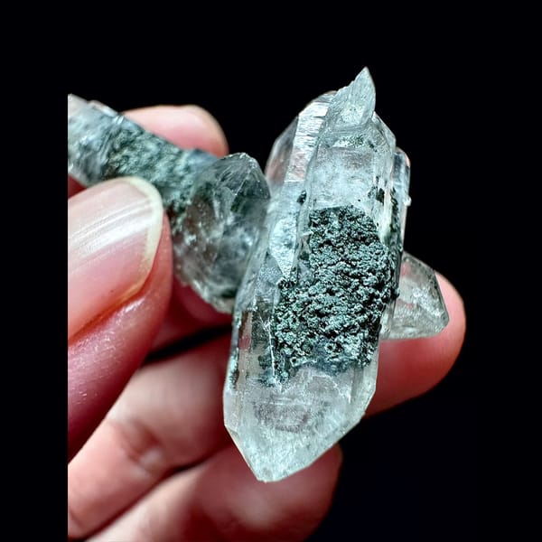 Green phantom double-terminated quartz from Inner Mongolia — detail view