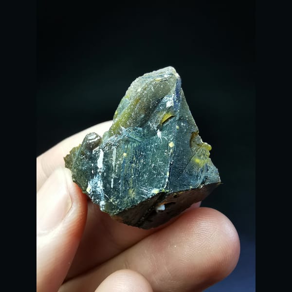 Sphalerite crystal from Inner Mongolia glowing orange when backlit — complete view