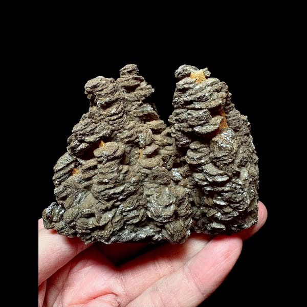 Dark brown layered calcite with quartz from Inner Mongolia — detail view