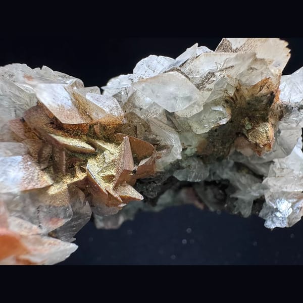 Butterfly petal calcite with iron minerals from Guizhou — detail view