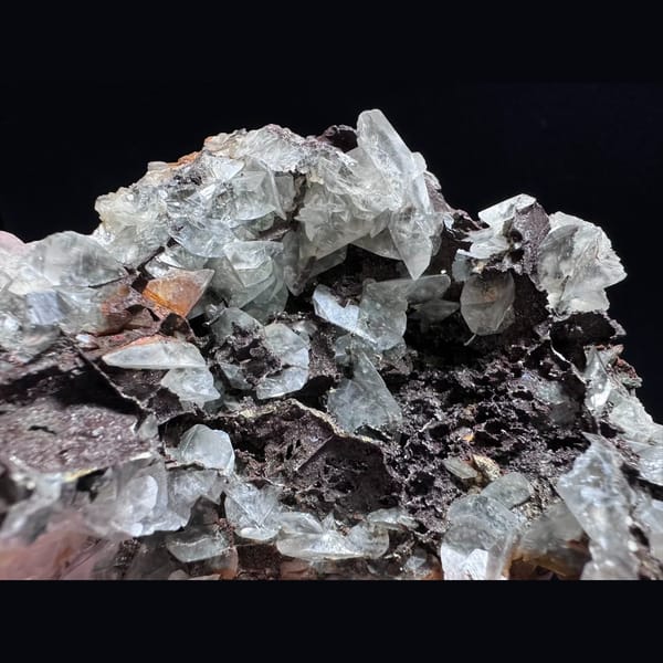 Butterfly petal calcite with iron minerals from Guizhou — detail view