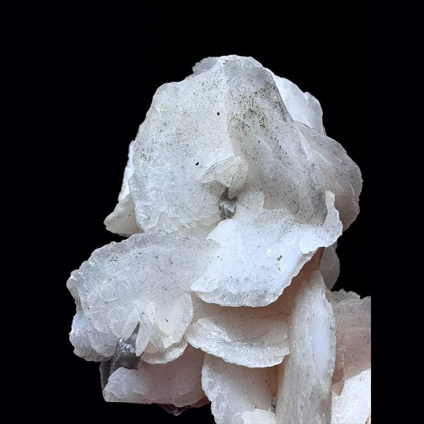 Pale yellow petal calcite floater from Inner Mongolia — detail view