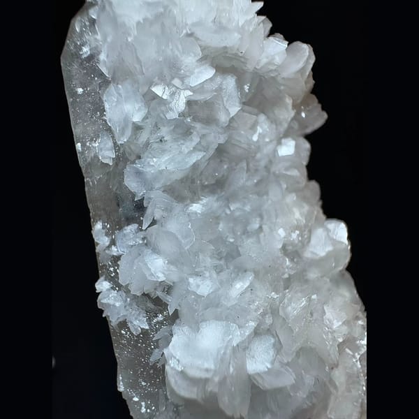 Sparkly quartz floater with petal calcite from Inner Mongolia — detail view