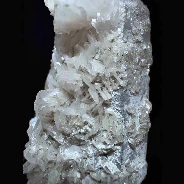 Sparkly quartz floater with petal calcite from Inner Mongolia — detail view
