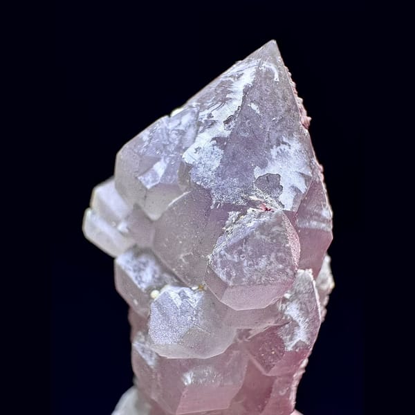 Amethyst castle quartz floater with calcite balls from Inner Mongolia — detail view