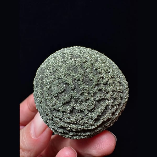 Ridged iron concretion ball from Yunnan — alternate view