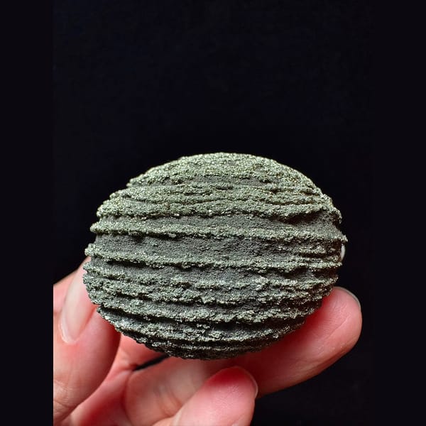 Ridged iron concretion ball from Yunnan — alternate view