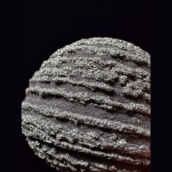 Ridged iron concretion ball from Yunnan — detail view