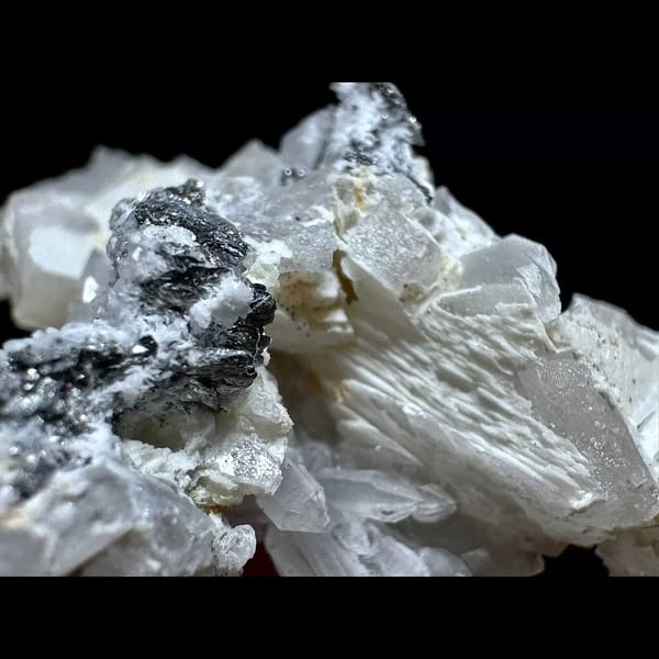 Quartz with bladed calcite and hematite from Inner Mongolia — detail view